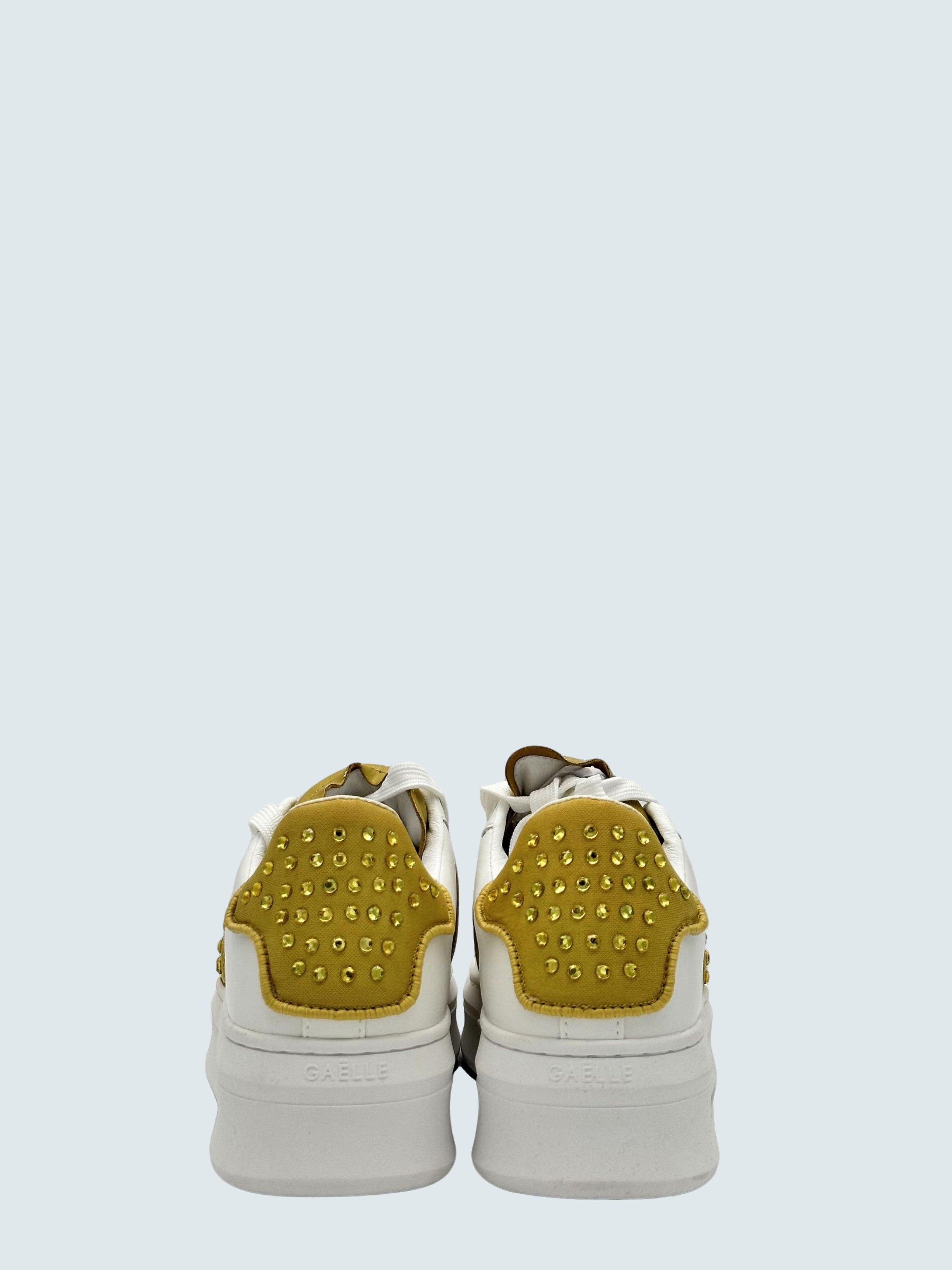 Sneaker Addict con mini borchie Oro - GAELLE