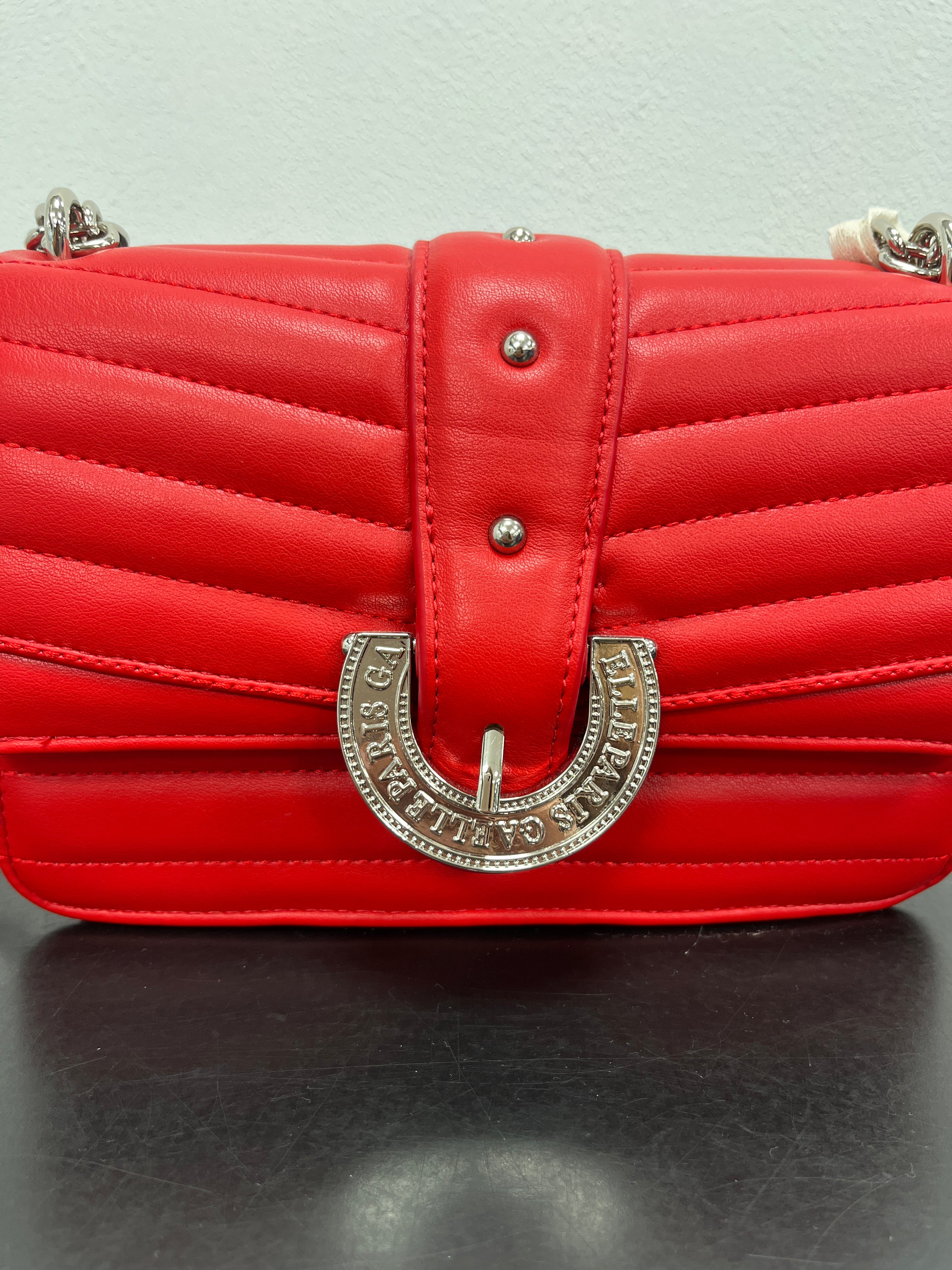 TRACOLLINA ROSSA CON DETTAGLI ARGENTO GAELLE